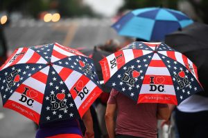 The Independence Day parade ended just as it started to rain on spectators along Constitution Avenue in Washington, D.C. MUST CREDIT: Photo by Marvin Joseph, The Washington Post.