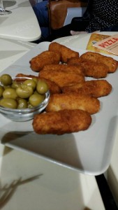 These are some tapas and they are called "croquetas". They are basically like a fishstick.