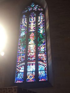 Memorial to holocaust victims in the Ulmer Münster. One of the many examples of fairly progressive stained glass found here. 
