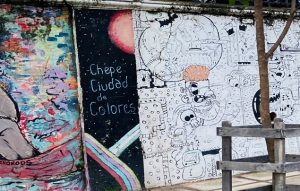 Colorful graffiti with writing in Spanish "Chepe Coidad de Colores"