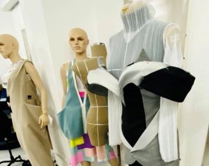 Mannequins with unfinished projects pinned on them